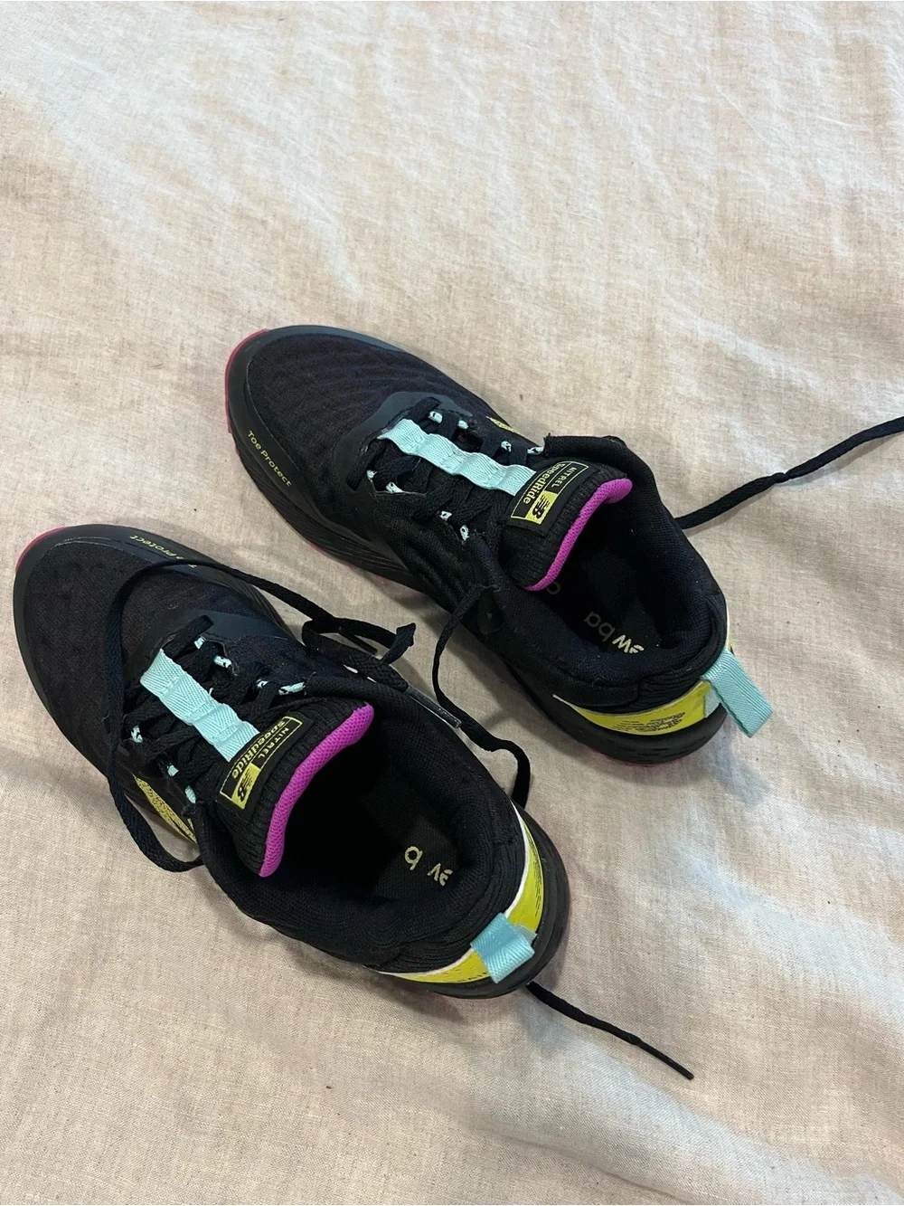 New Balance Women's Black Shoes with Yellow Heel and Pink Outsole